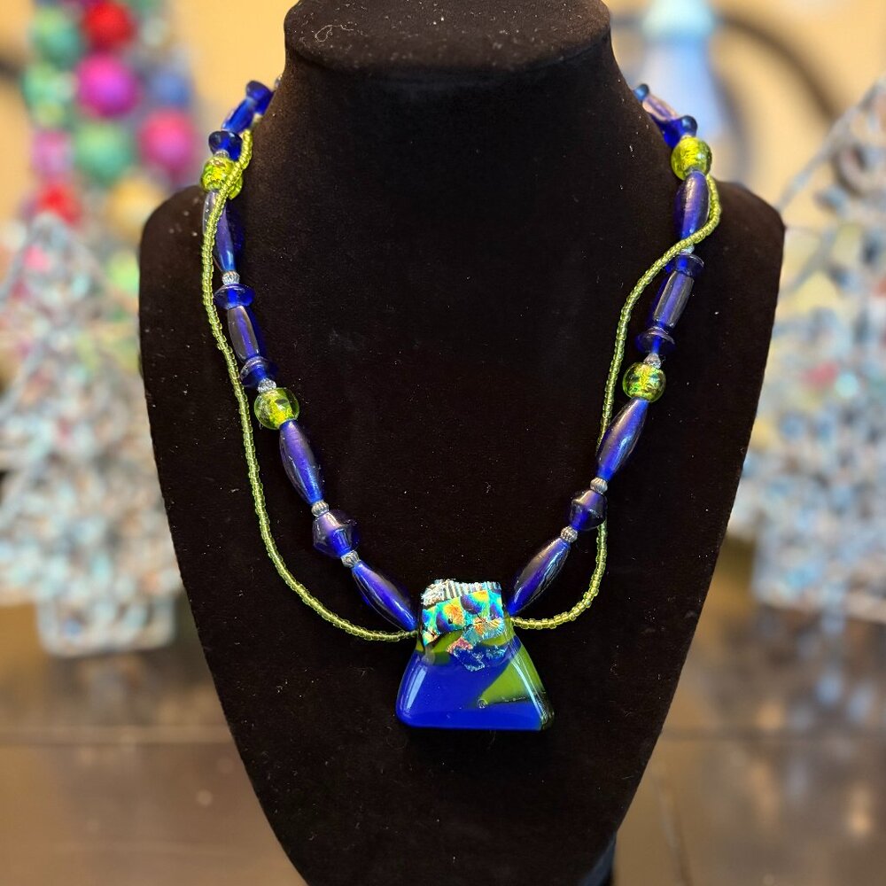 Dichroic glass pendant on glass bead and silver necklace